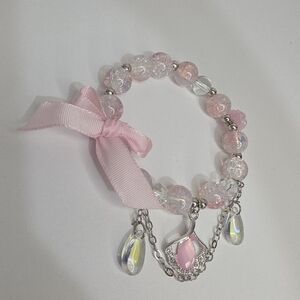Elegant Pink Beaded Bracelet with Bow and Charms